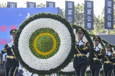 (miniature) La Chine organise sa neuvième cérémonie commémorative nationale pour les victimes du massacre de Nanjing dans le Mémorial aux victimes du massacre de Nanjing par les envahisseurs japonais à Nanjing