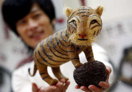 (miniature) Des tigres sculptés avec des cheveux