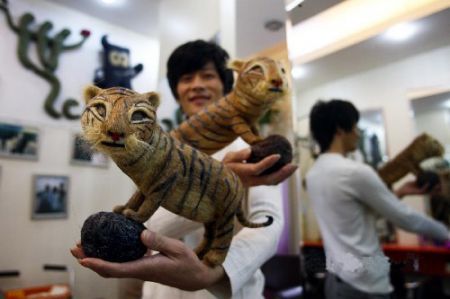(miniature) Des tigres sculptés avec des cheveux