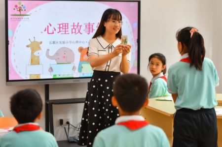 (miniature) Des enfants suivent un cours en santé mentale à l'Ecole primaire expérimentale de l'arrondissement de Yuelu