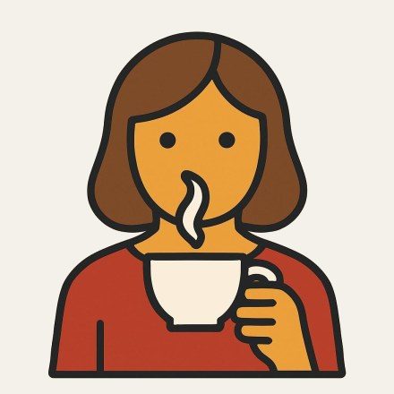 A woman drinking a cup of tea.
