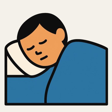 The head of a sleeping person on a cream pillow, eyes closed, under a blue blanket.
