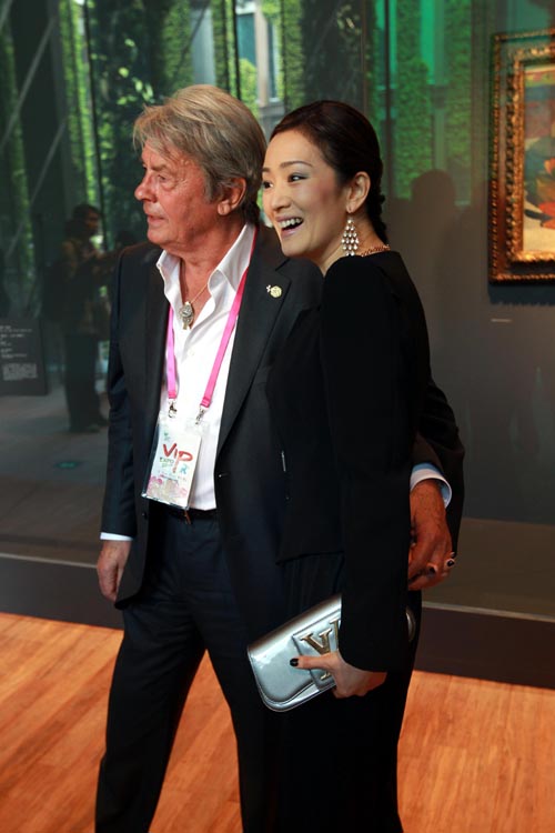 Gong li et Alain Delon