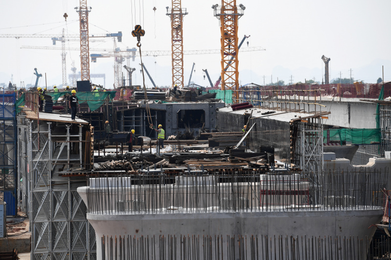 Des ouvriers sur le chantier de la gare du Nord à Nanning