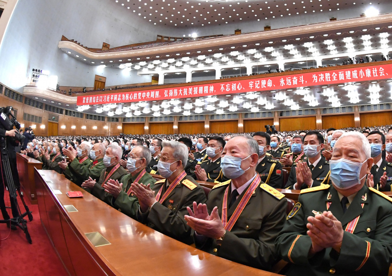 Une réunion marquant le 70e anniversaire de l'entrée des Volontaires du peuple chinois (VPC) en République populaire démocratique de Corée (RPDC) pour combattre dans la Guerre de résistance à l'agression américaine et d'aide à la RPDC s'est tenue au Grand Palais du Peuple à Beijing