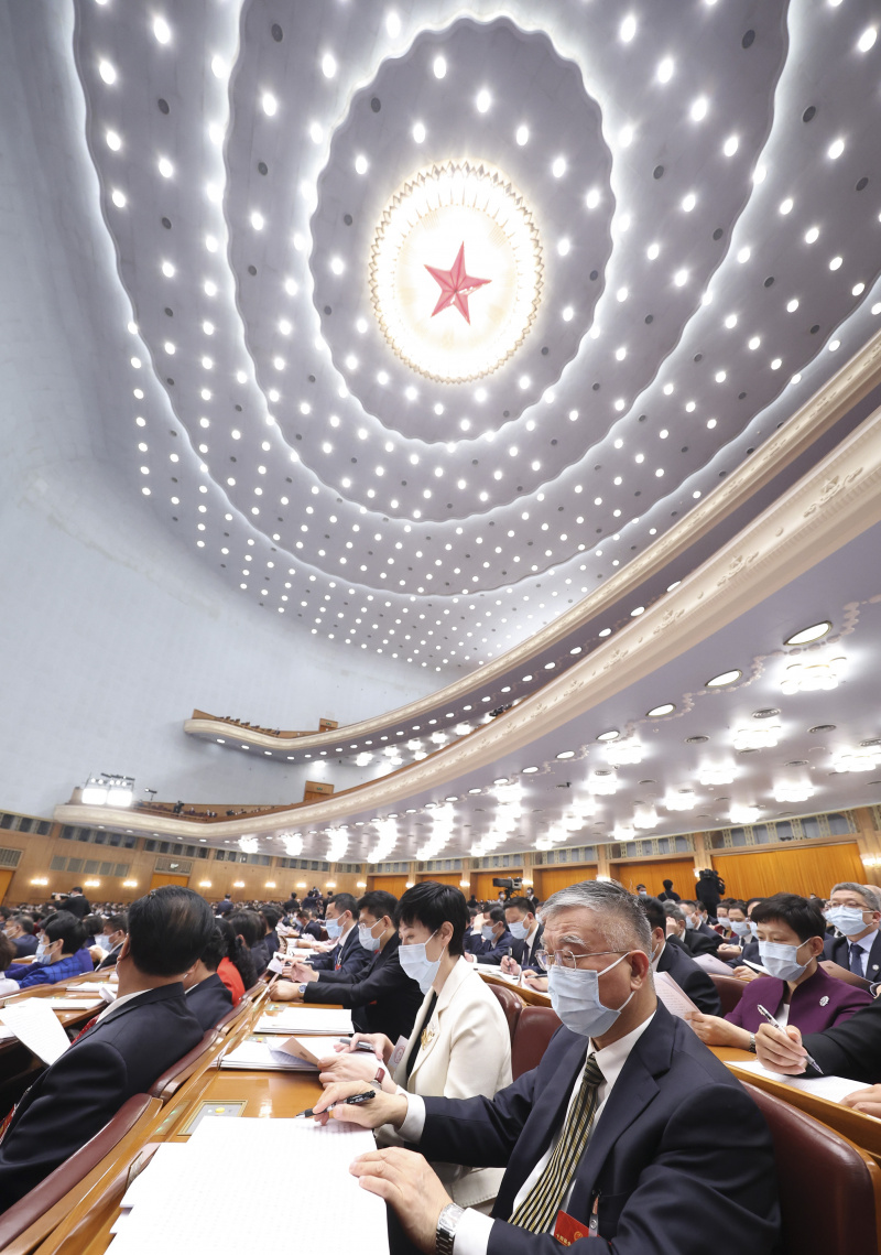 Les députés à la 14e Assemblée populaire nationale (APN) assistent à la deuxième réunion plénière de la première session de la 14e APN au Grand Palais du Peuple à Beijing