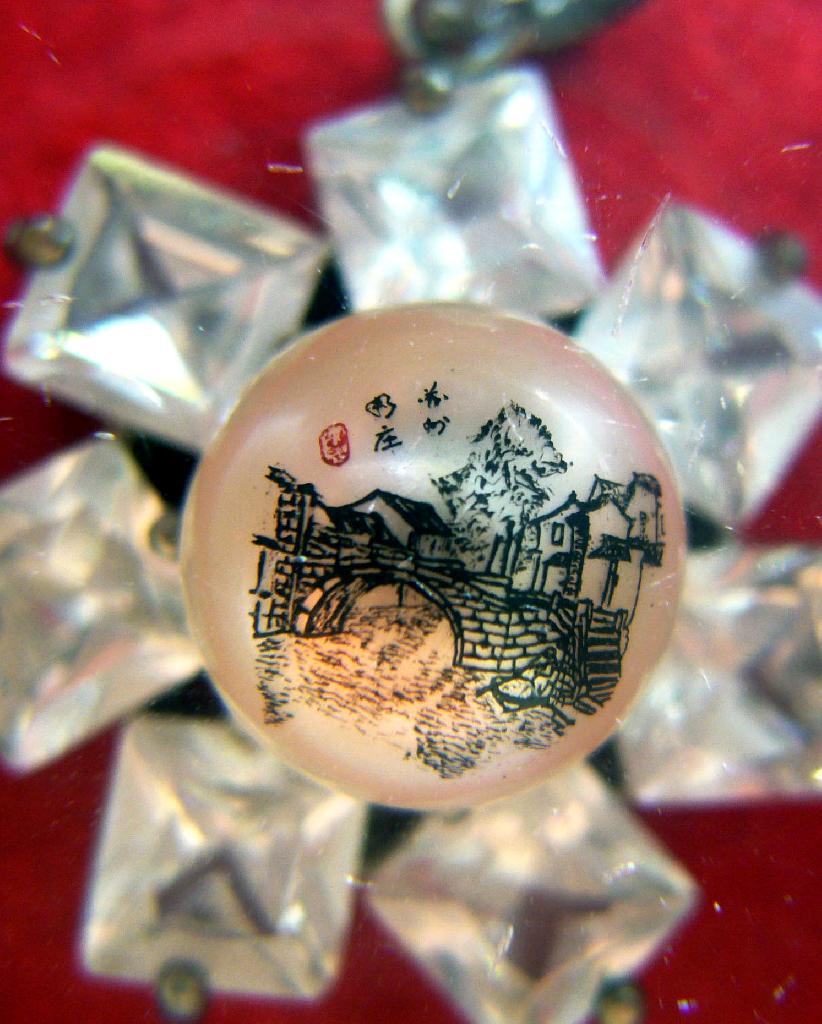 Perle gravée de Zhouzhuang