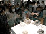 Des gens visitent le musée du Palais de Hong Kong