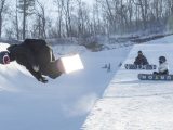 Des skieurs participent à une séance d'entraînement dans la station de ski de Yabuli
