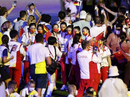 (miniature) Des membres de la délégation olympique chinoise lors de la cérémonie de clôture des Jeux olympiques de Tokyo 2020 à Tokyo