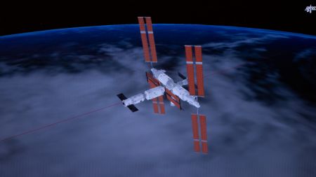 (miniature) Image simul&eacute;e captur&eacute;e au Centre de contr&ocirc;le des vols a&eacute;rospatiaux de Beijing montrant la combinaison du vaisseau spatial habit&eacute; chinois Shenzhou-17 et de la station spatiale