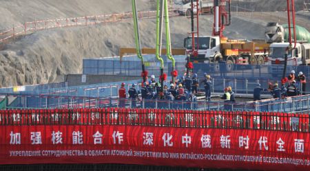(miniature) Photo prise le 19 mai 2021 montrant la cérémonie d'ouverture de la construction du réacteur 3 de la centrale nucléaire de Xudapu à Huludao