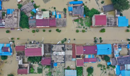 (miniature) Photo aérienne des inondations dans le bourg de Guzhen