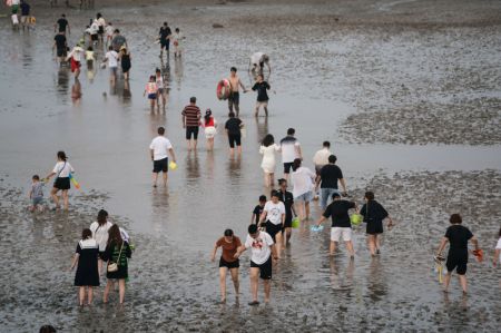 (miniature) Des touristes sur la plage