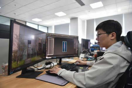 (miniature) Un employé travaille pour une modélisation tridimensionnelle chez l'entreprise Yueneng Technology