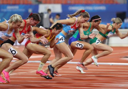 (miniature) La Chinoise Liang Xiaojing (3e à gauche) lors de la finale du 100m femmes de la 31e édition estivale des Jeux mondiaux universitaires de la FISU