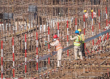 (miniature) Des ouvriers sur le chantier du complexe immobilier de Joy City à Wuhan