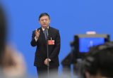 Photos (Deux Sessions) Chine : interviews de ministres par liaison vid�o